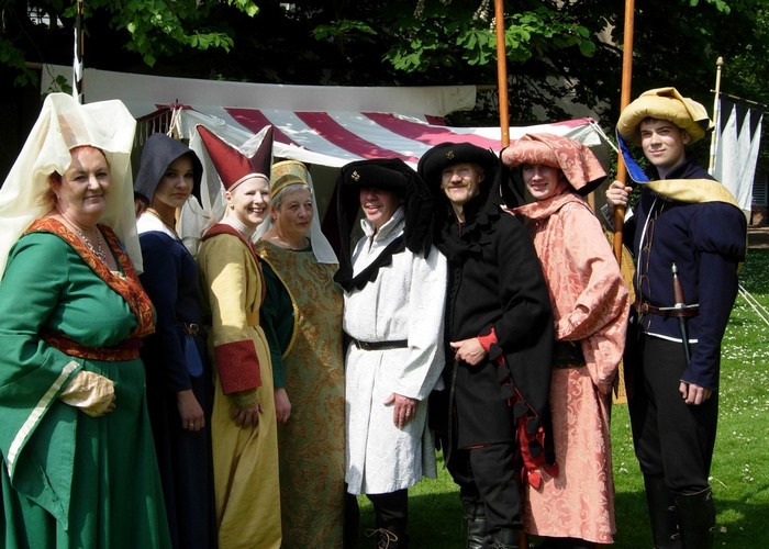 medieval costumes worn by feast guests
